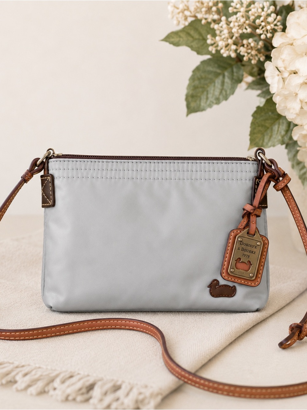 Dooney & Bourke Light Gray Nylon Crossbody with Tan Leather Trim